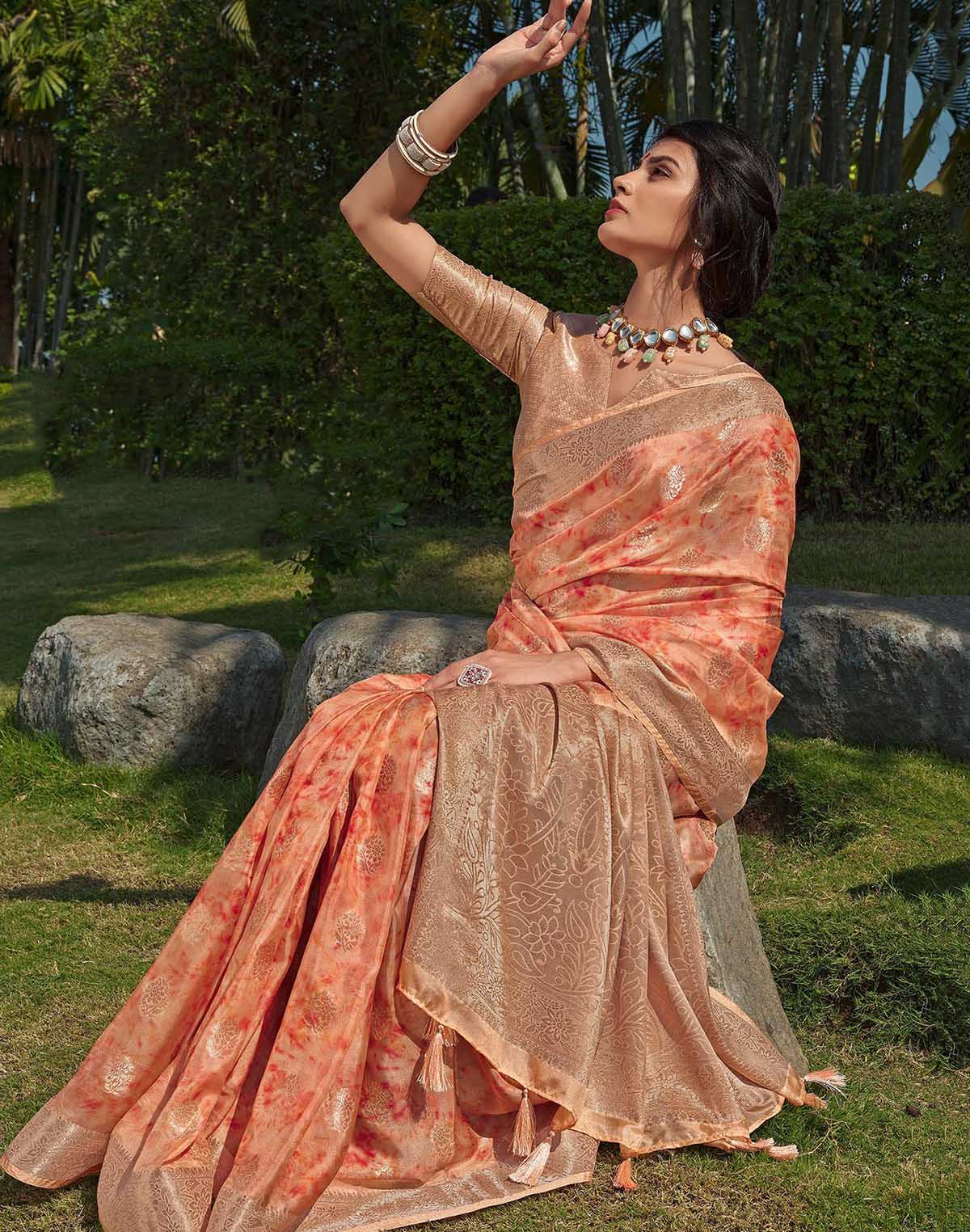 Floral Pattern Orange Colour Soft Silk Saree