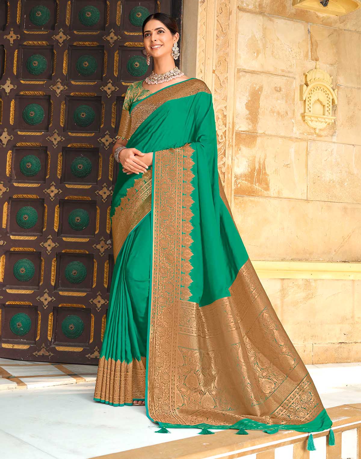 Sea Green Satin Silk Saree with Golden Heavy Border