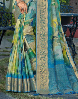 Collection of Teal Blue Graphic Print Party Wear Dola Silk Saree in a gallery layout