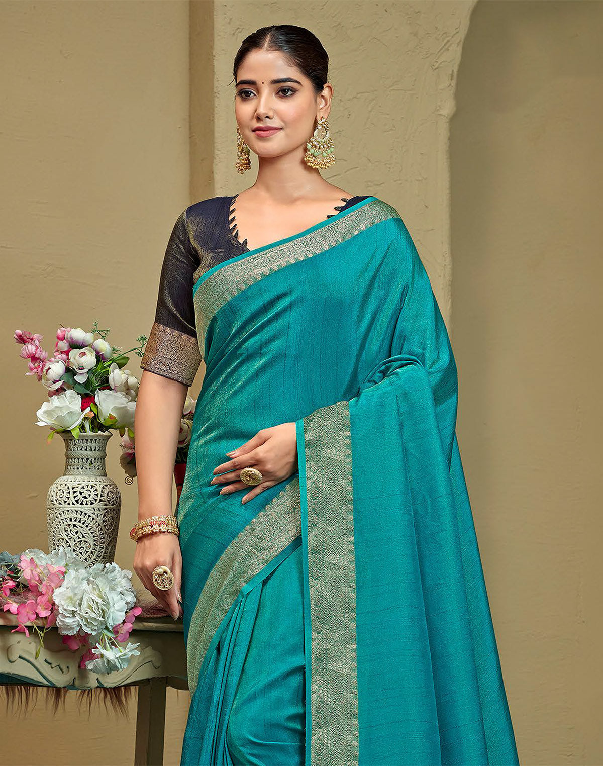 Collection of Sky Blue Raw Silk Plain Saree in a gallery layout