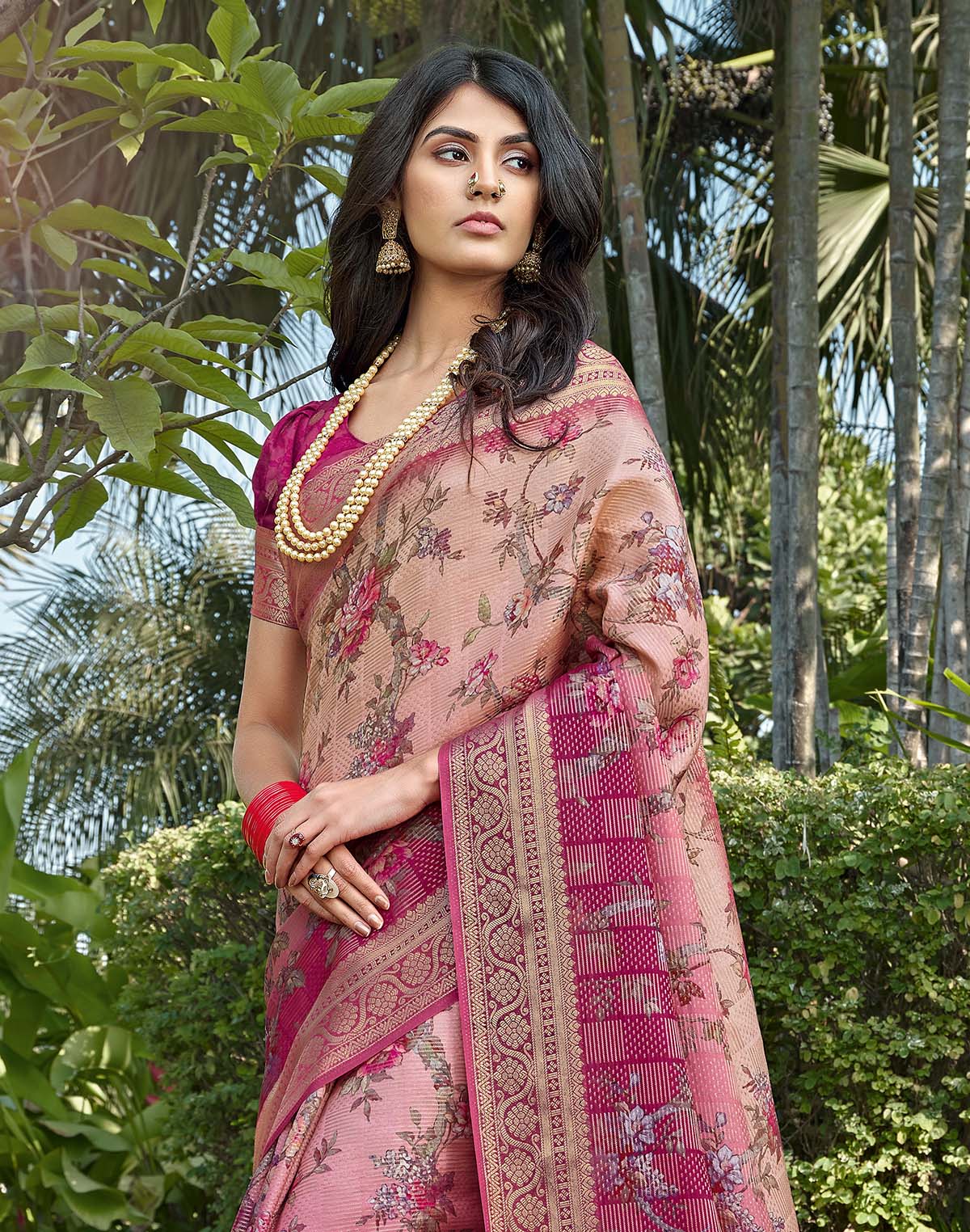 Collection of Light Pink all over Floral design Dola Silk Saree in a gallery layout