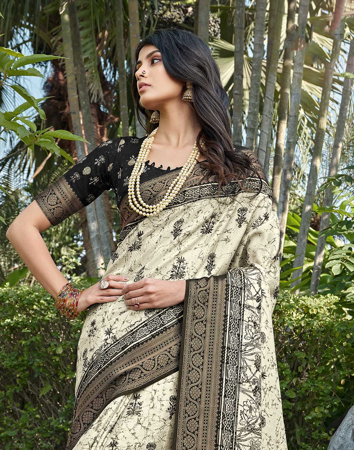 Collection of Off White Floral bunches Soft Dola Silk Saree in a gallery layout