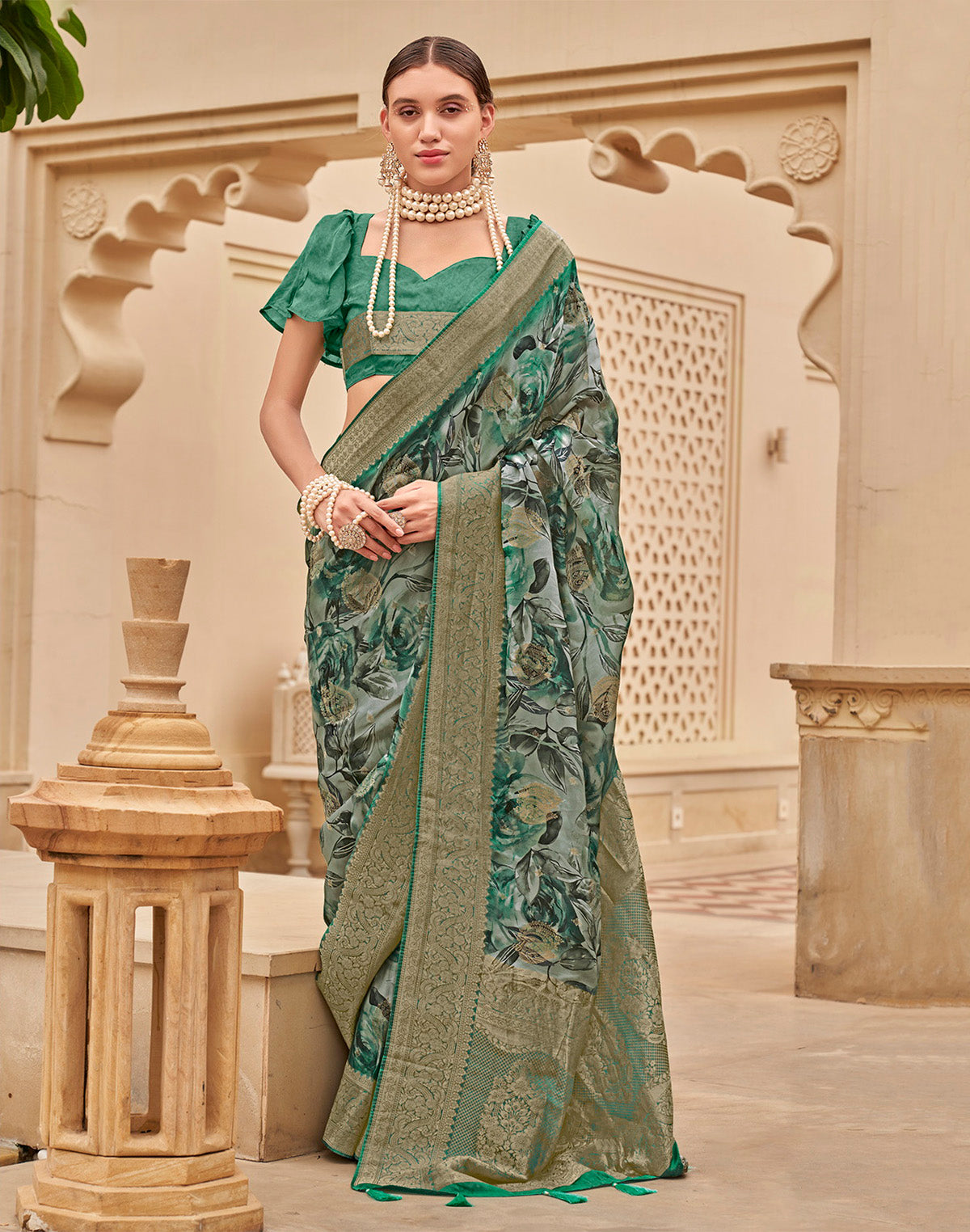 Collection of Green Floral design Art Silk Saree with Golden Zari Border in a gallery layout