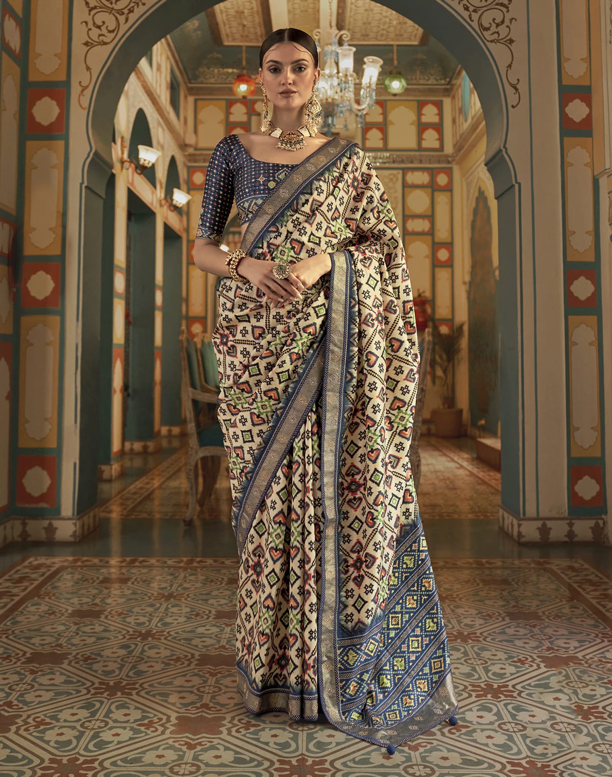 Collection of Admiral Cream Ikat Print Patola Saree in a gallery layout