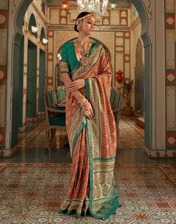 Collection of Beautiful Orange Ikat Print Patola Saree in a gallery layout