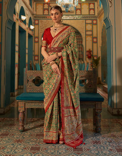 Collection of Green and Maroon Ikat Print Patola Saree in a gallery layout