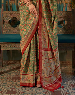 Collection of Green and Maroon Ikat Print Patola Saree in a gallery layout