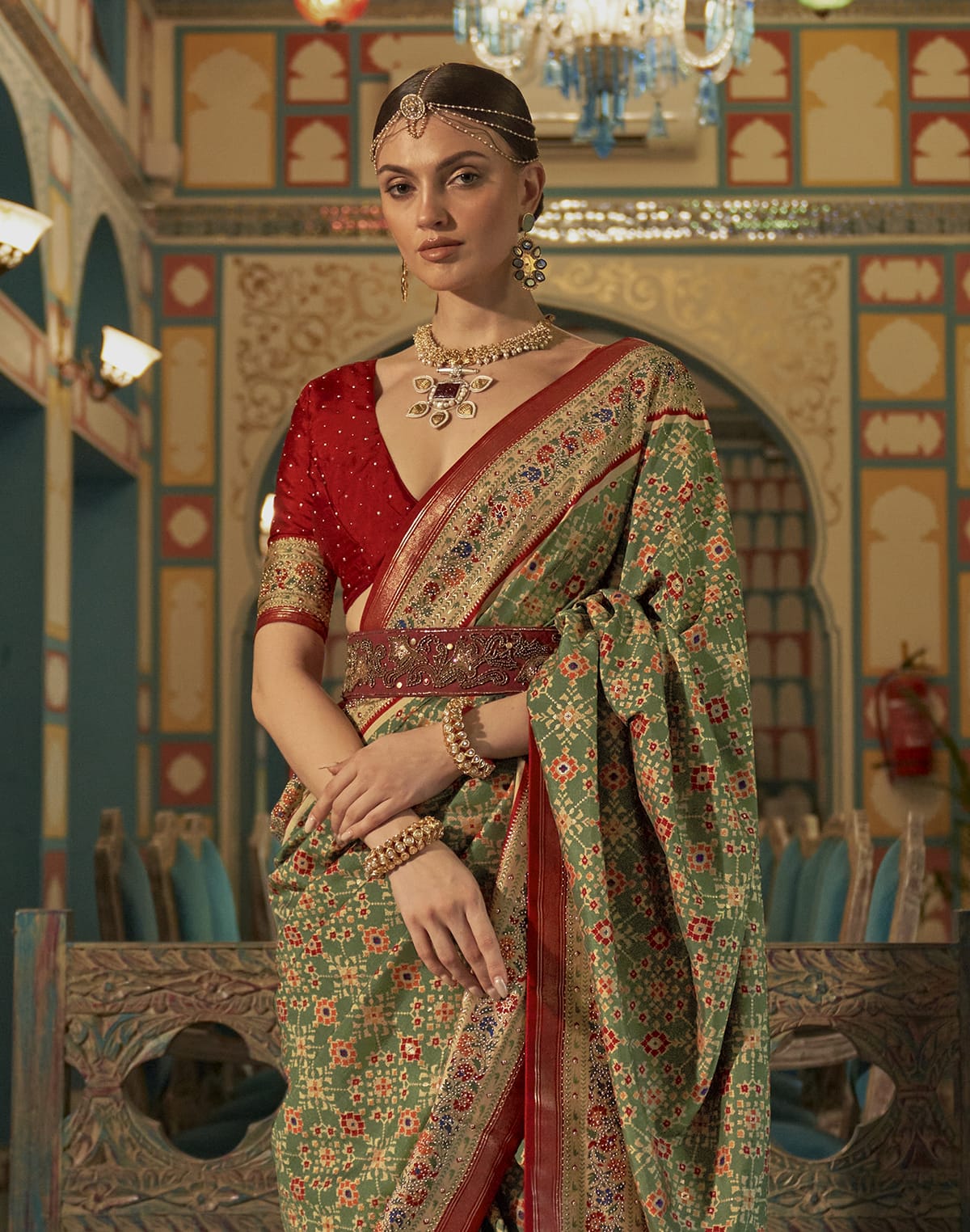 Collection of Green and Maroon Ikat Print Patola Saree in a gallery layout