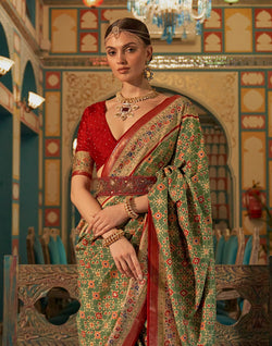 Collection of Green and Maroon Ikat Print Patola Saree in a gallery layout