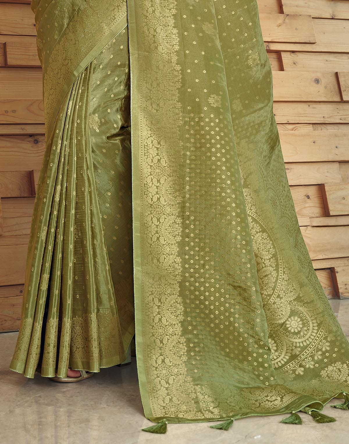 Collection of Olive Green Semi Crape Embellished work Saree in a gallery layout