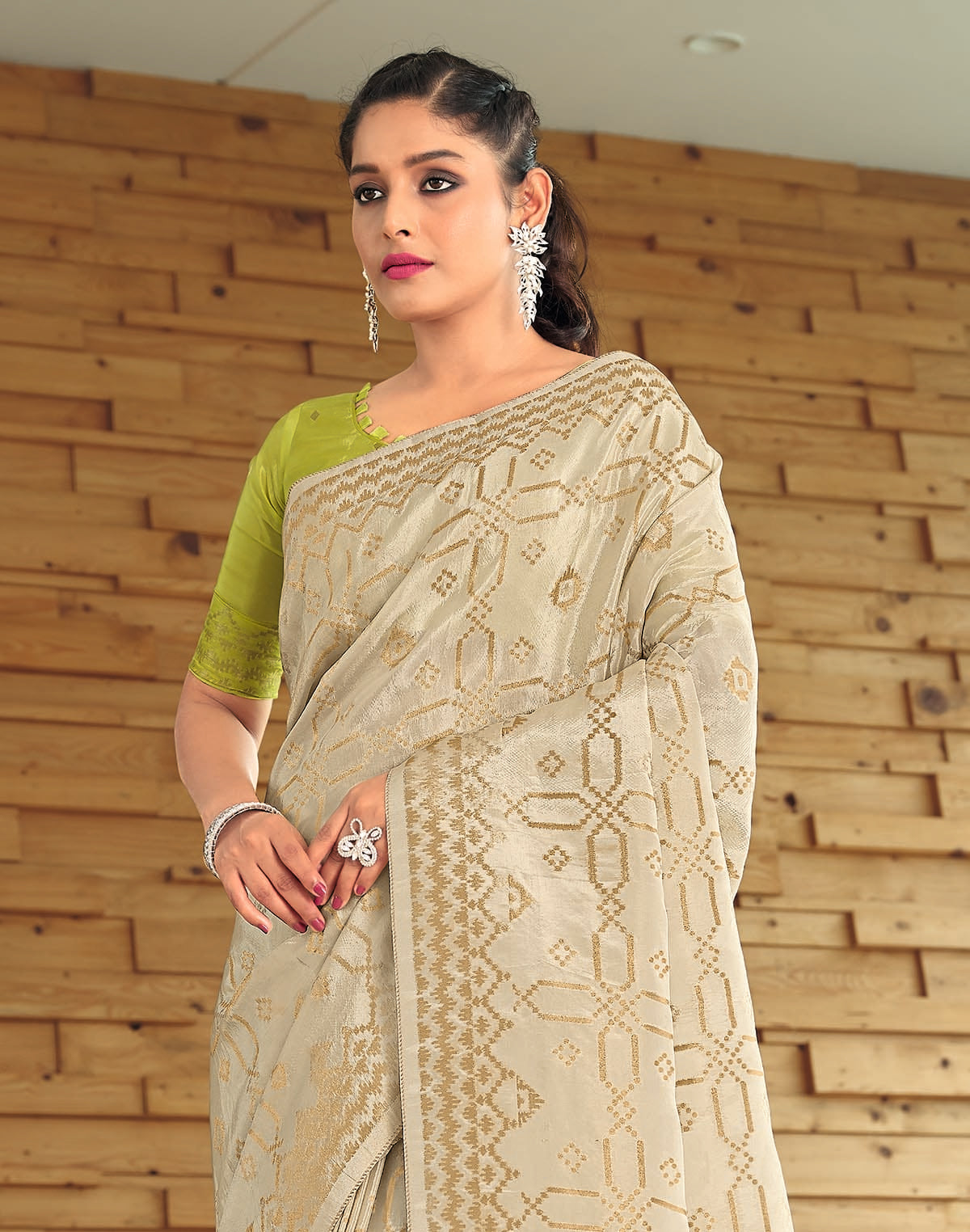 Collection of Cream and Gold Semi Crape Saree in a gallery layout