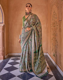 Collection of Green Coloured Soft Silk Party Wear Saree in a gallery layout