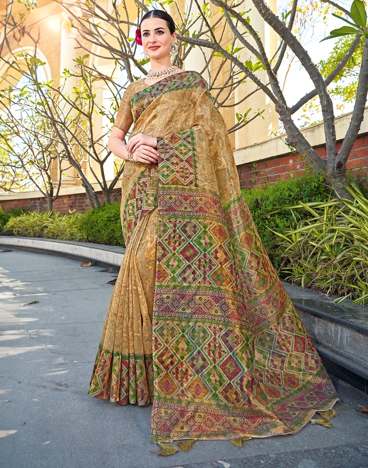 Collection of Gold all over Self Floral Print Tissue Saree in a gallery layout