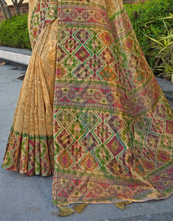 Collection of Gold all over Self Floral Print Tissue Saree in a gallery layout