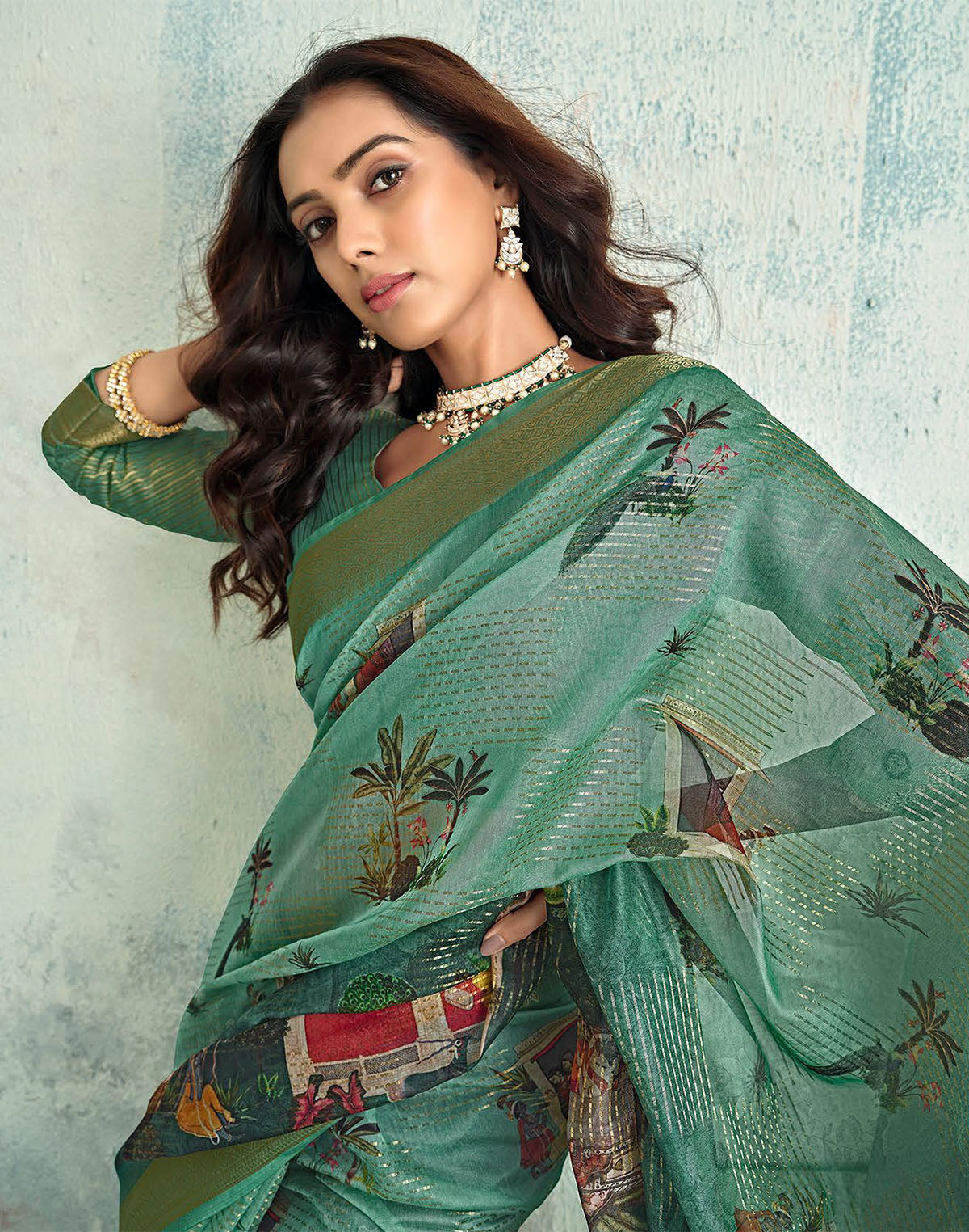 Collection of Green Digital Floral Print Tissue Saree With Zari Border in a gallery layout