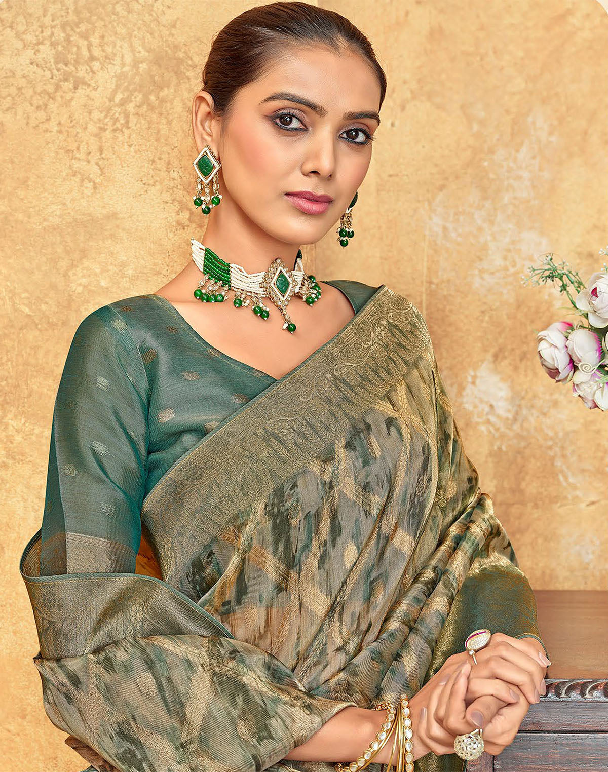 Collection of Green All Over Woven Design Organza Saree in a gallery layout