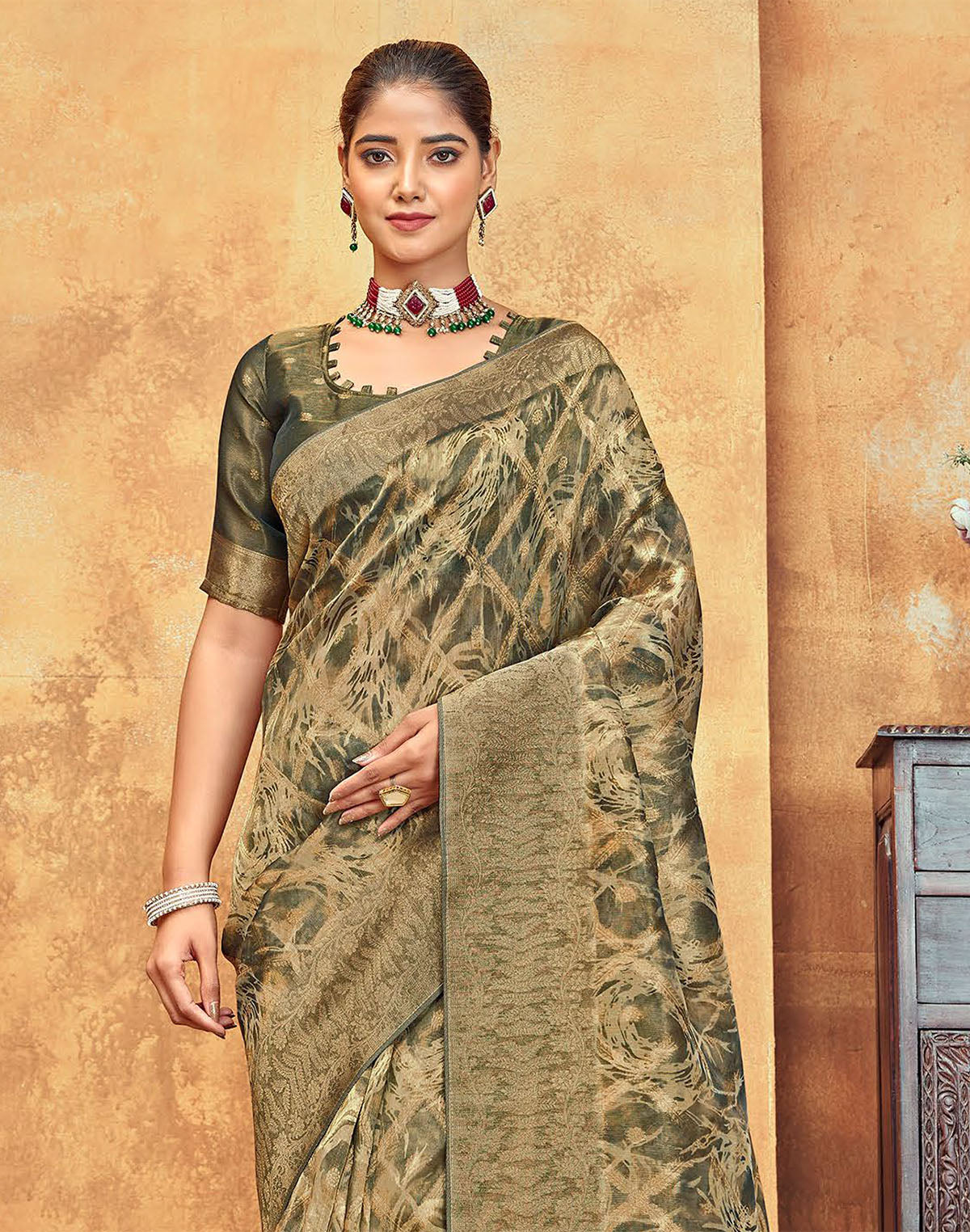 Collection of Light Mehendi Green Brocade Design Organza Saree in a gallery layout