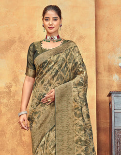 Collection of Light Mehendi Green Brocade Design Organza Saree in a gallery layout