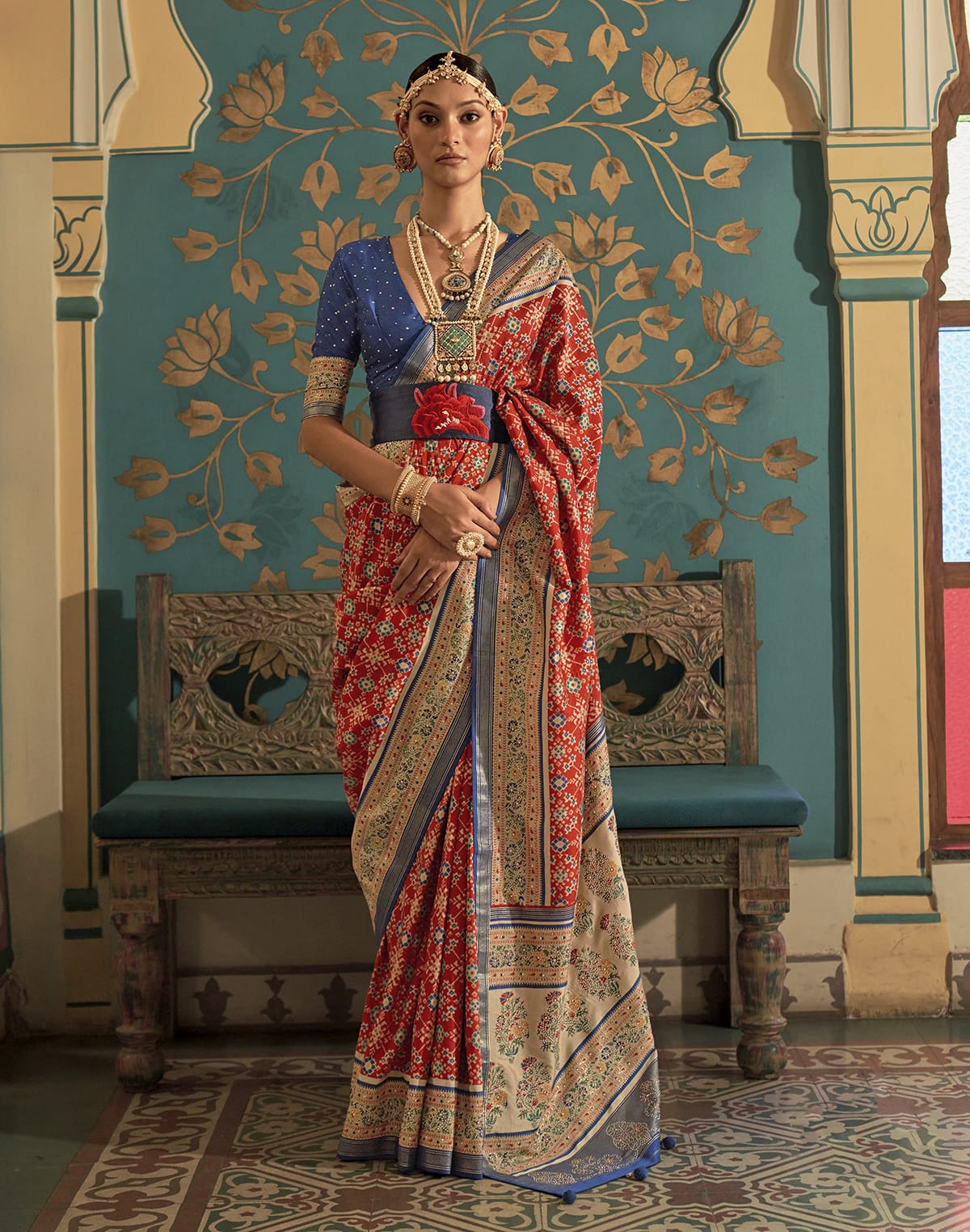 Collection of Dark Orange Ikat Print Soft Patola Silk Saree in a gallery layout