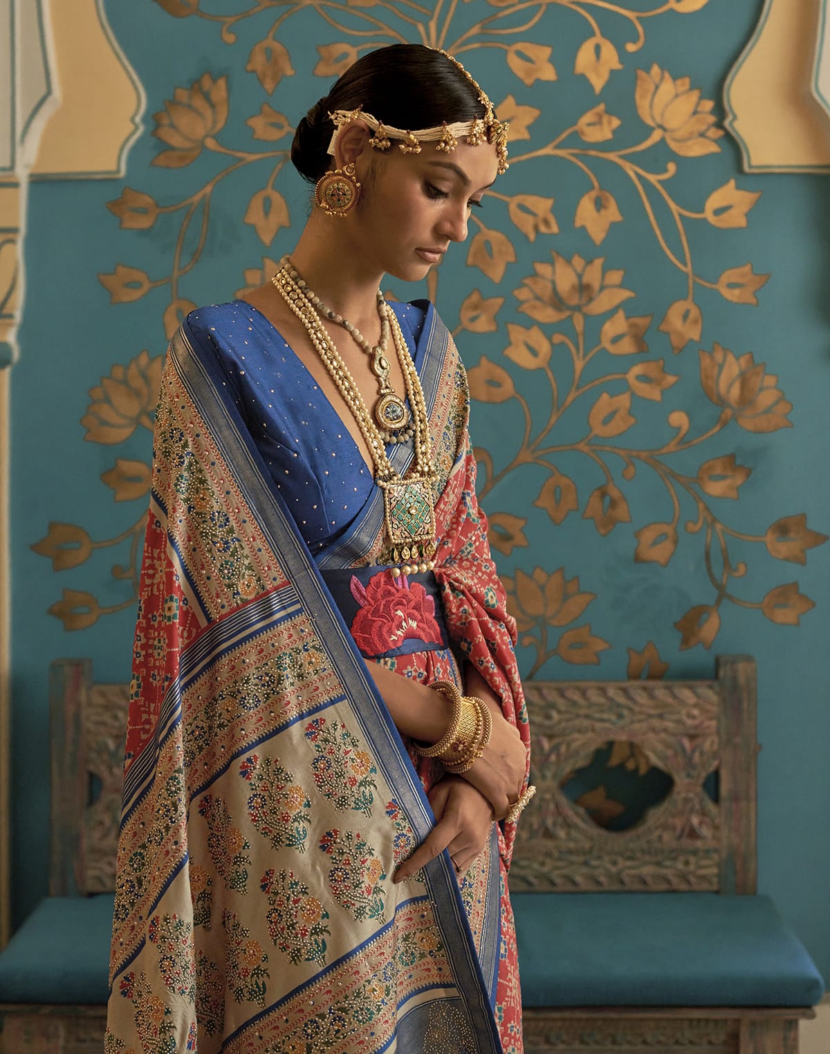 Collection of Dark Orange Ikat Print Soft Patola Silk Saree in a gallery layout