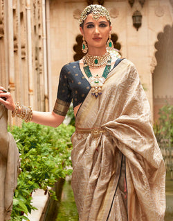 Collection of Beige Woven design Banaras Patola Silk Saree in a gallery layout