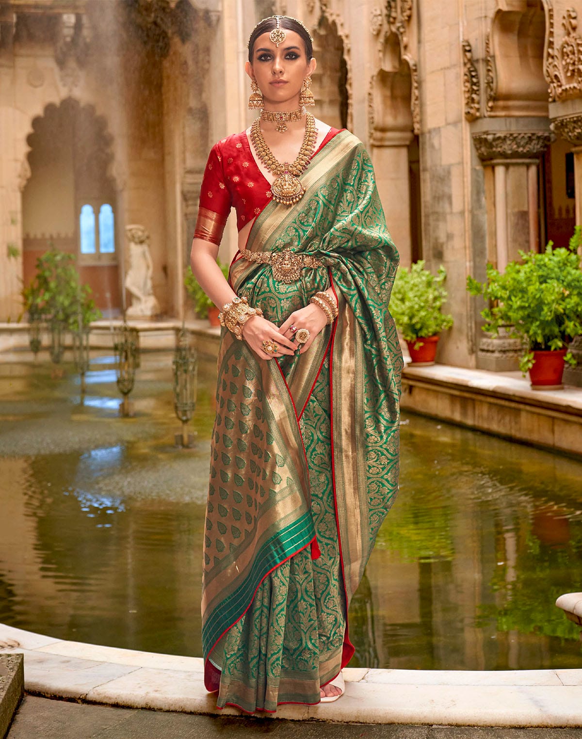 Collection of Sea Green Floral design Banaras Patola Silk Saree in a gallery layout