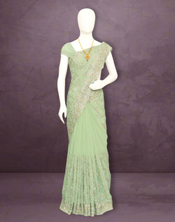 Collection of Pista Green Floral Georgette Stones work Saree in a gallery layout