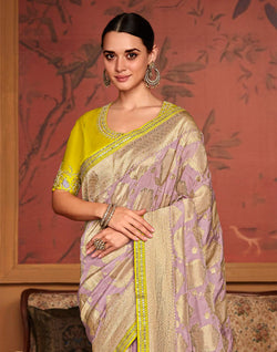 Collection of Light Purple Woven Design Fancy Lace Border Dola Silk Saree in a gallery layout