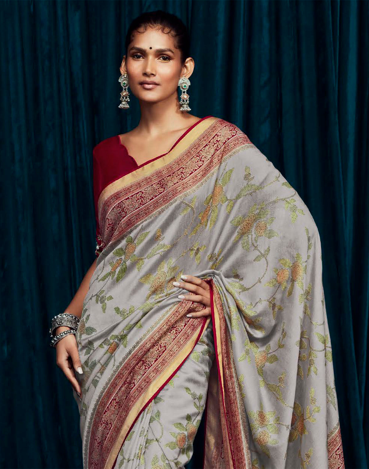 Collection of Light Grey Floral Brasso Silk Saree With Red Coloured Designer Blouse in a gallery layout