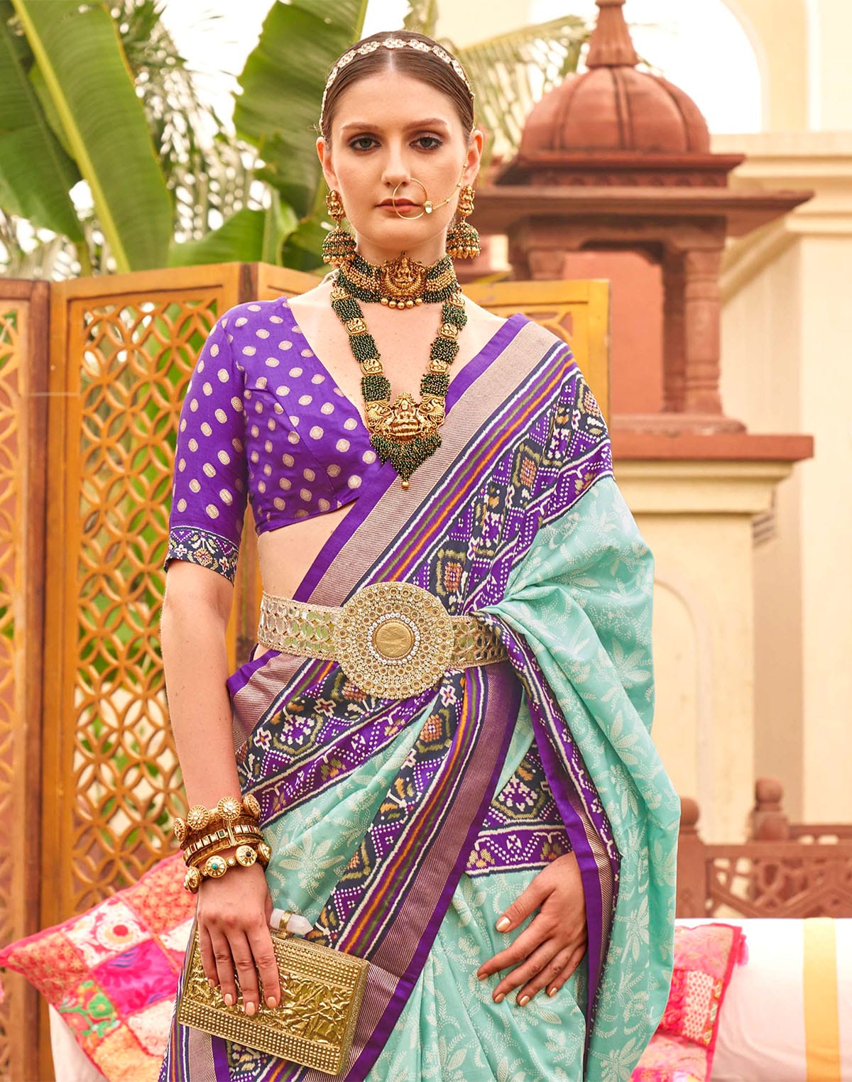 Collection of Alluring Sea Green smooth Patola Saree in a gallery layout