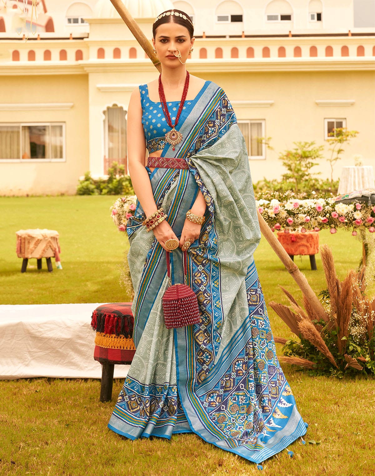 Collection of Attractive Sage Green Floral Print Patola Silk Saree in a gallery layout