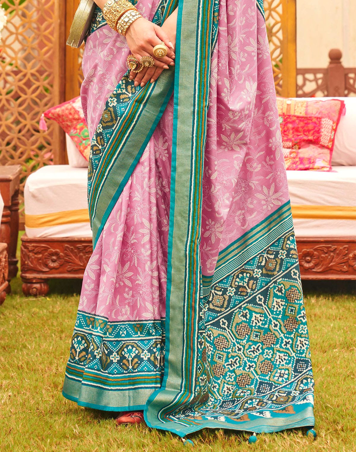 Collection of Glamorous Pink Patola Print Saree in a gallery layout