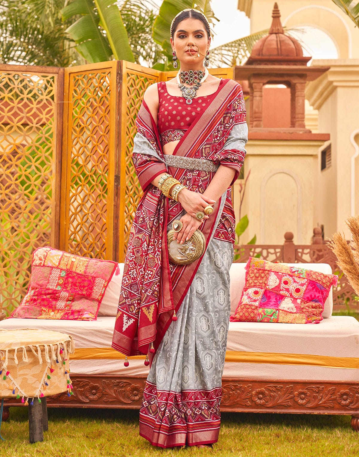 Collection of Grey and Red Traditional Patola Silk Saree in a gallery layout