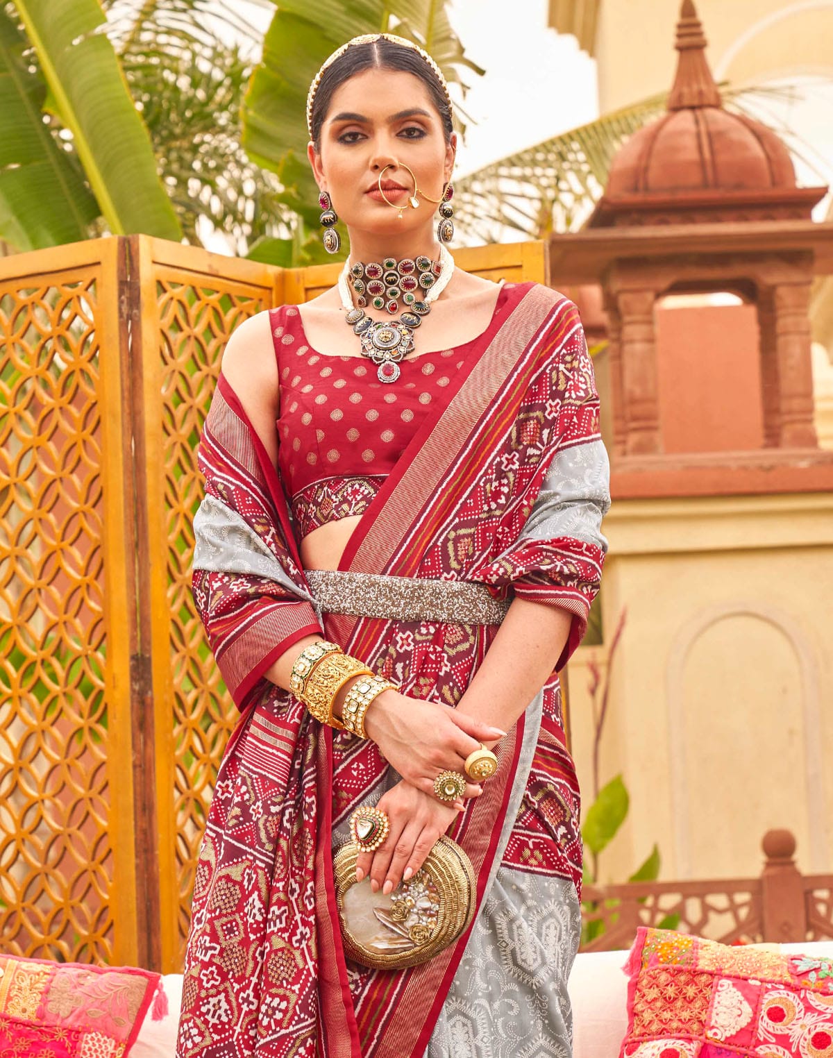 Collection of Grey and Red Traditional Patola Silk Saree in a gallery layout