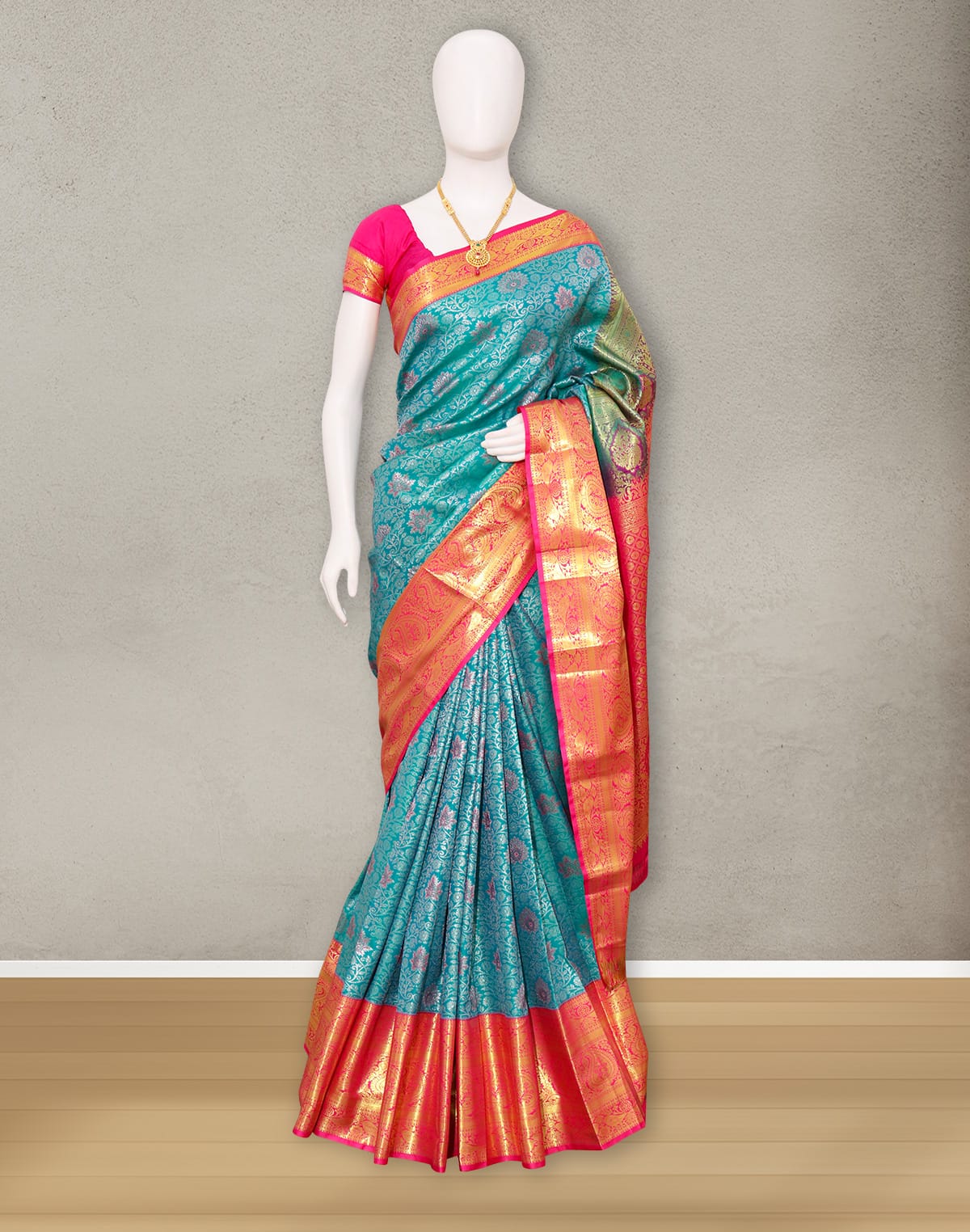 Collection of Rama Green all over Floral Silver zari Contrast Border Saree in a gallery layout