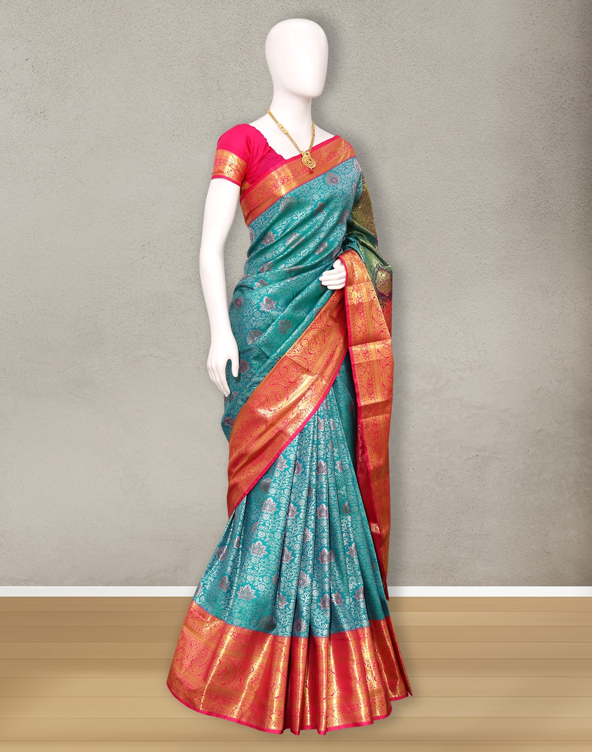 Collection of Rama Green all over Floral Silver zari Contrast Border Saree in a gallery layout