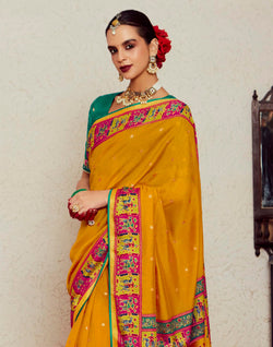 Collection of Mustard Yellow Brass Silk Designer Saree in a gallery layout