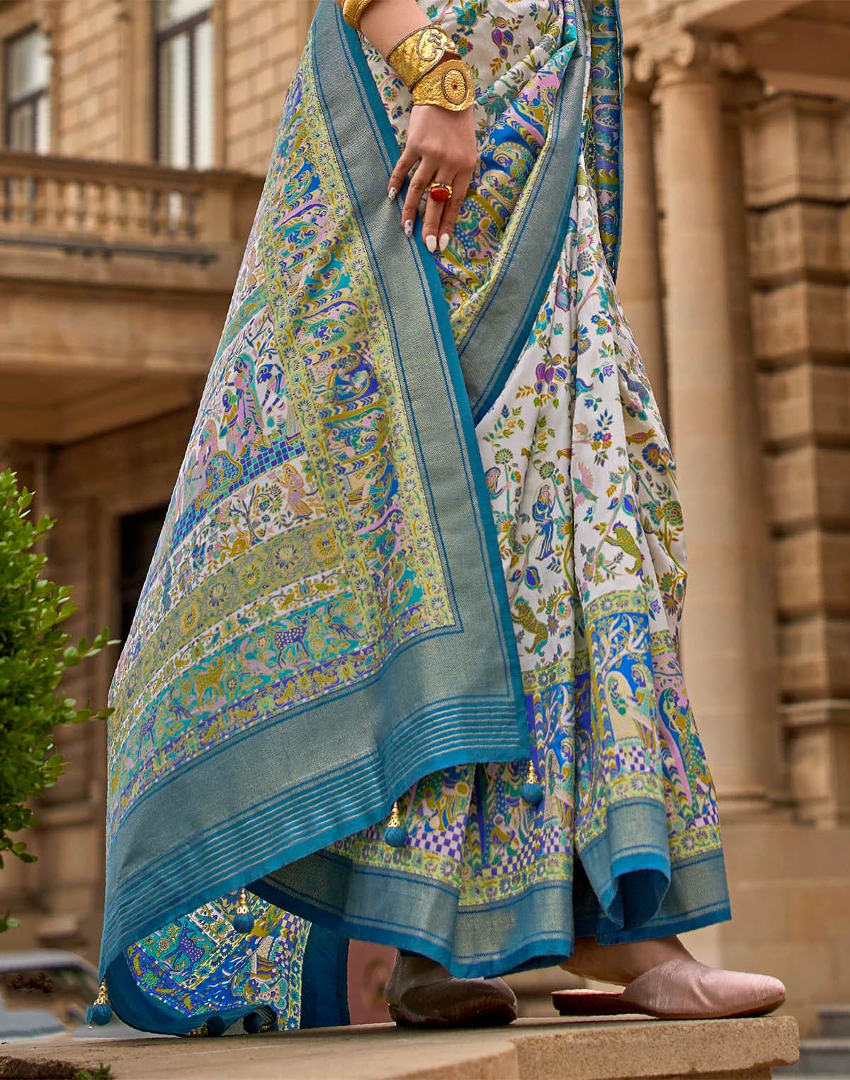 Collection of Cyan Blue Kalamkari Print Patola Silk Saree in a gallery layout