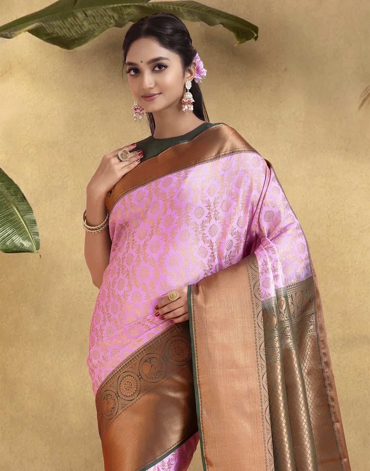 Collection of Exclusive Baby Pink all over Motif design Soft Banaras Silk Saree in a gallery layout