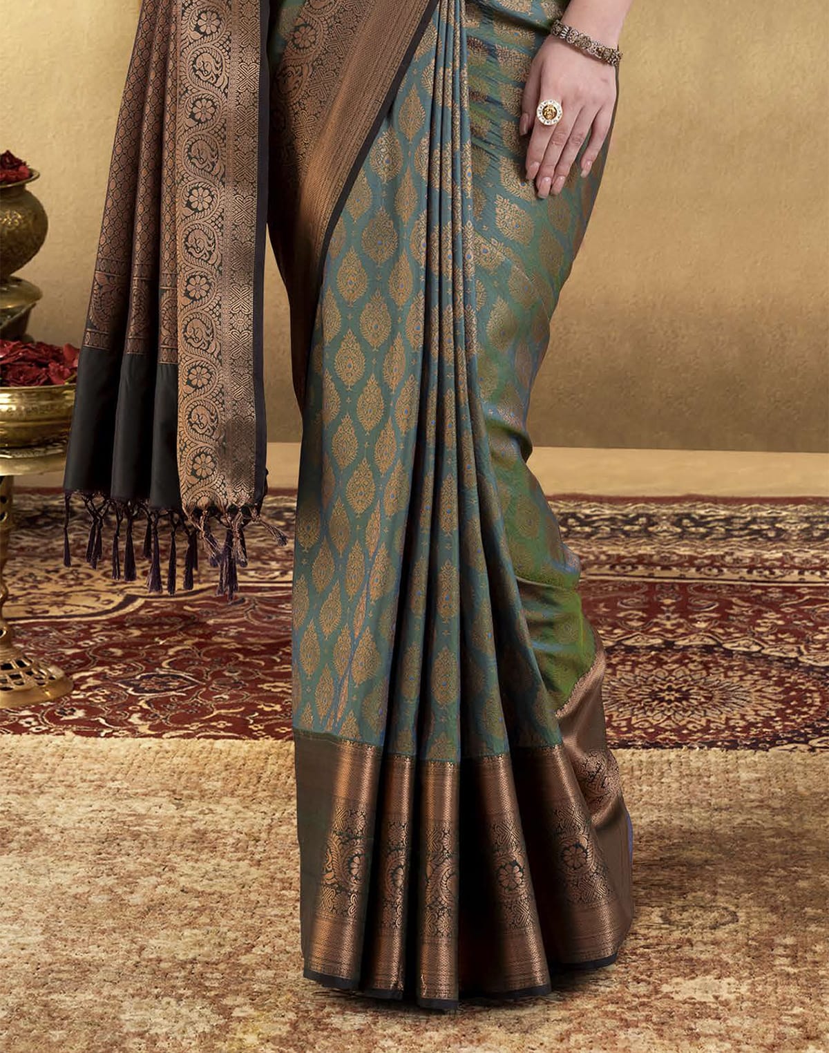 Collection of Green woven design Copper Zari Soft Banaras Silk Saree in a gallery layout