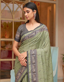 Collection of Light Mehendi Green Jute Silk Fancy Saree in a gallery layout