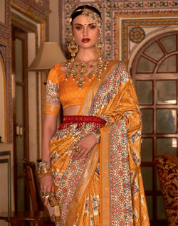 Collection of Mustard Bandhini Print smooth Patola Silk Saree in a gallery layout