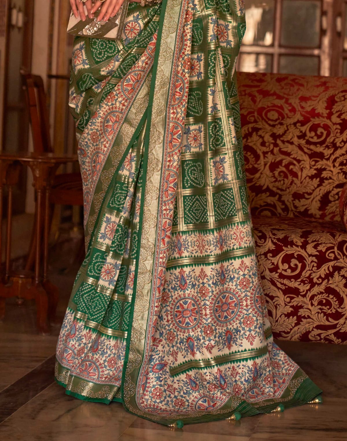 Collection of Green all over beautiful Bandhini Print Patola Saree in a gallery layout