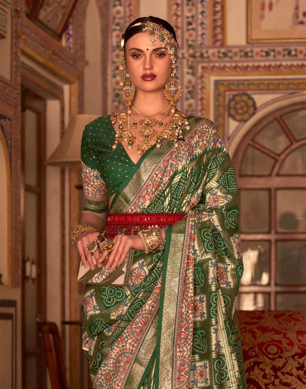 Collection of Green all over beautiful Bandhini Print Patola Saree in a gallery layout