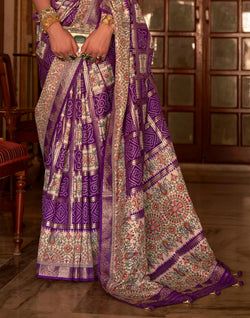 Collection of Elegant Purple Colour Patola Silk Designer Saree in a gallery layout