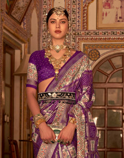 Collection of Elegant Purple Colour Patola Silk Designer Saree in a gallery layout