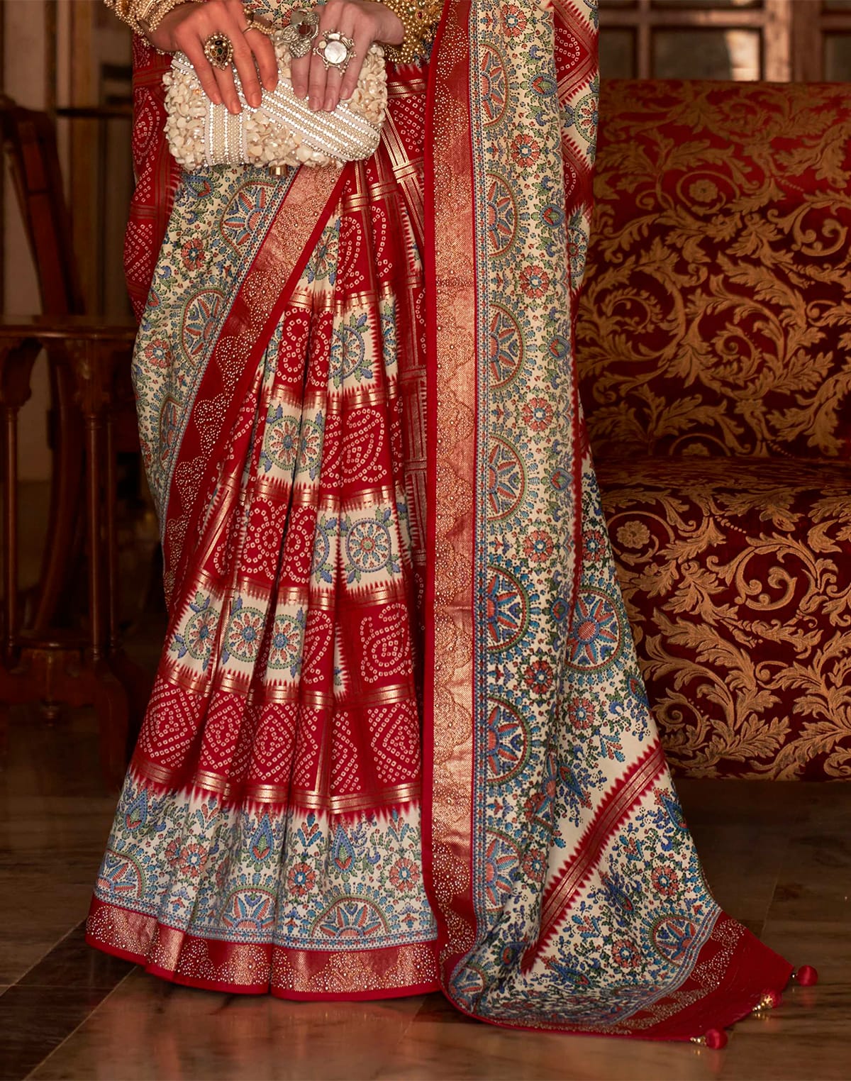 Collection of Red Patola Silk Bandhini Print Party Wear Saree in a gallery layout