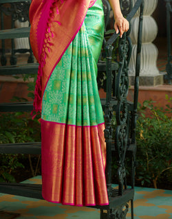 Collection of Green Floral Pure Silk Kanjivaram Saree With Big Contrast Skut Border in a gallery layout