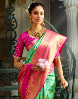 Collection of Green Floral Pure Silk Kanjivaram Saree With Big Contrast Skut Border in a gallery layout