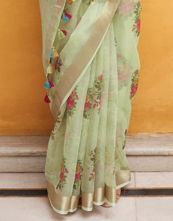 Collection of Light Pista Green Floral Print Organza Saree With Tussels in a gallery layout